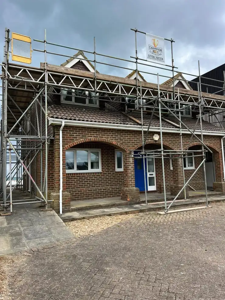 Champion scaffold with roof-level protection during roofing works in East Sussex